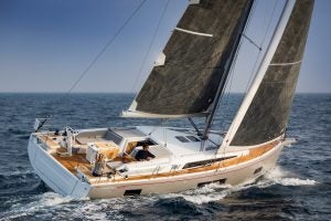 Couple sailing a Beneteau Oceanis 46.1 monohull