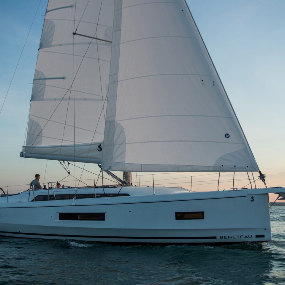 Beneteau Oceanis 40.1 monohull under sail at sunset