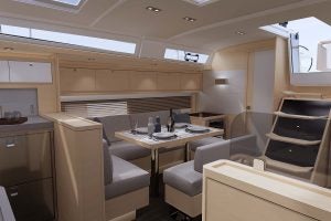 Espace de repas et escaliers d’accès aux cabines du voilier Dufour 470