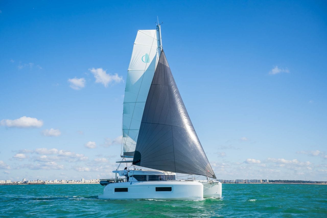 Side view of Lagoon 38 Catamaran sailing in the sea