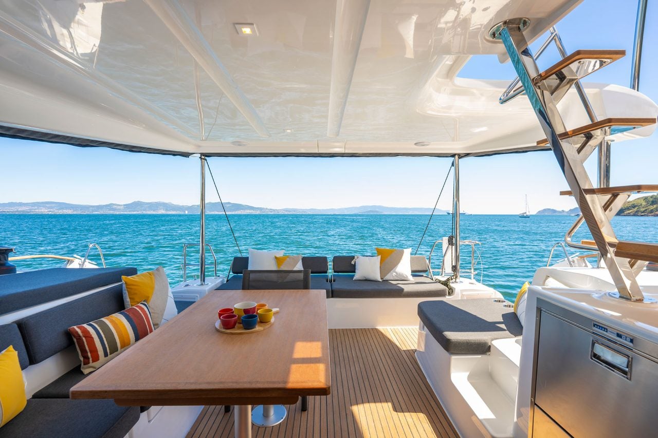 Cockpit table and seating area of a Lagoon 43 catamaran