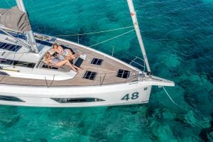 Top view of the Dufour 48 front deck and sunbathing area