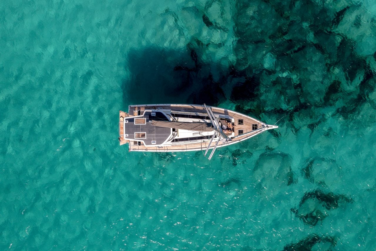 Exterior top view of the Dufour 48 luxury sailboat at anchor