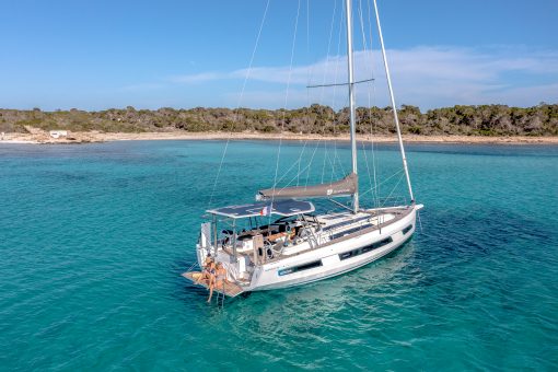 Dufour 48 monohull sailboat at anchor